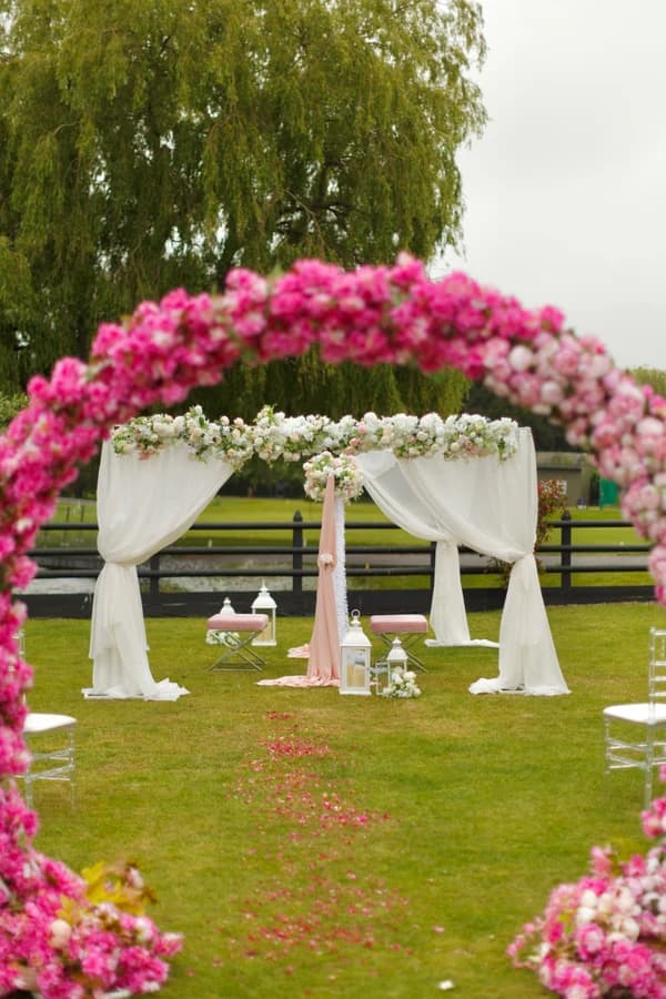 A floral arch in a garden